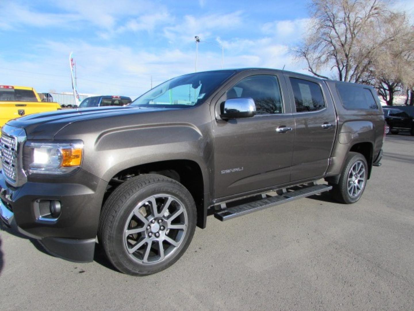 2019 Smokey Quartz Metallic /Gray Leather GMC Canyon Denali Crew Cab 4WD Long Box (1GTG6EEN6K1) with an 3.6L V6 DOHC 24V engine, 8A transmission, located at 4562 State Avenue, Billings, MT, 59101, (406) 896-9833, 45.769516, -108.526772 - Photo#0